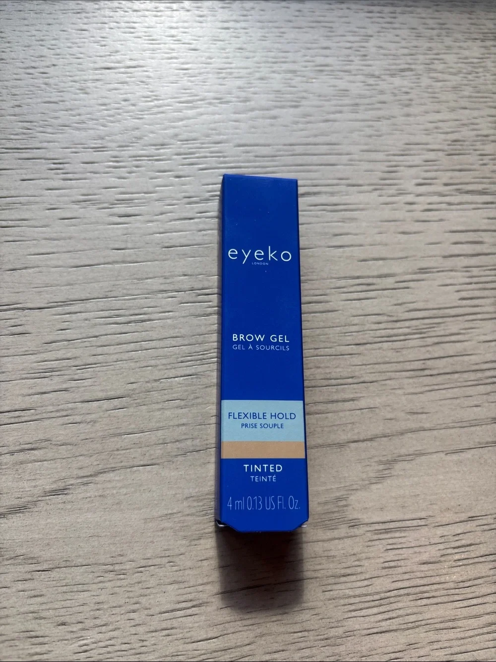 Eyeko Brow Gel Tinted Flexible Hold – Blue Box with Beige Accent